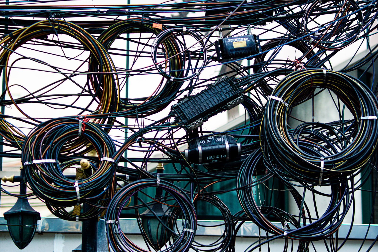 A tangle of interconnected cables, symbolizing AppExchange app sprawl and accumulated technical debt